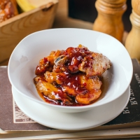 Chicken wings on hot sauce